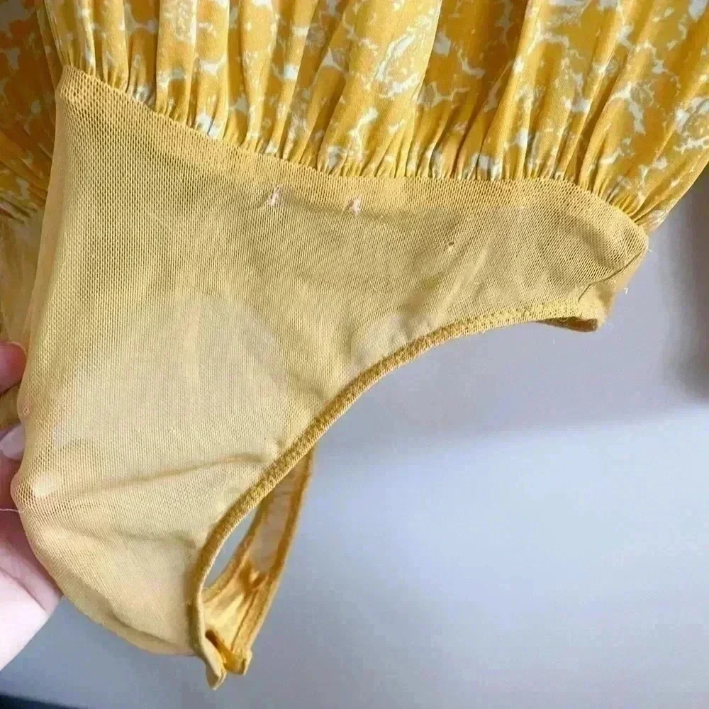 Free‎ People yellow floral bodysuit XS